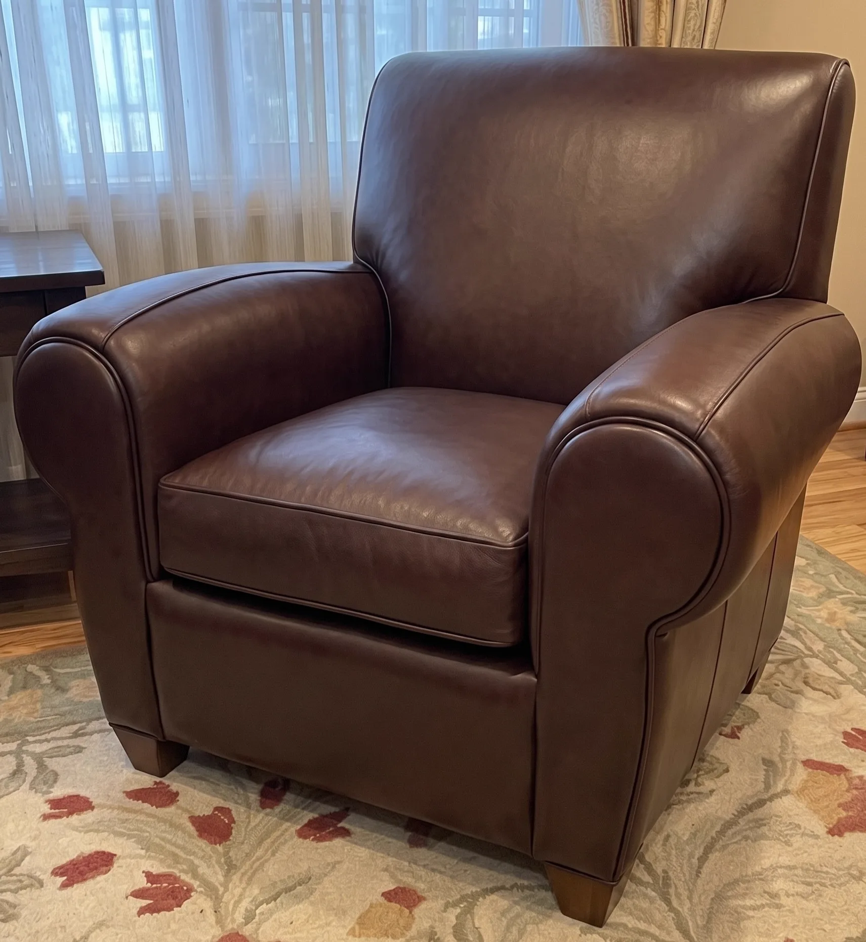 Brown leather sofa after patina restoration
